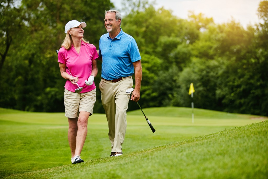 Couple Playing Golf